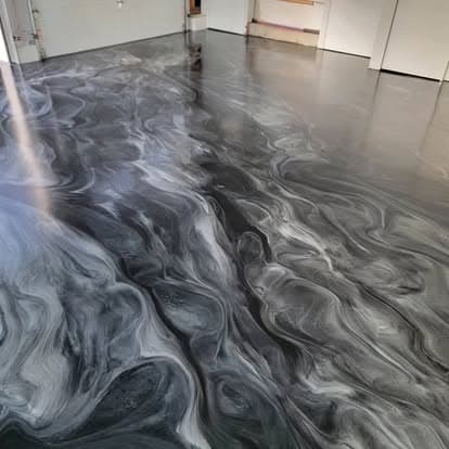 Same commercial space with stunning black and white metallic marble swirl epoxy floor